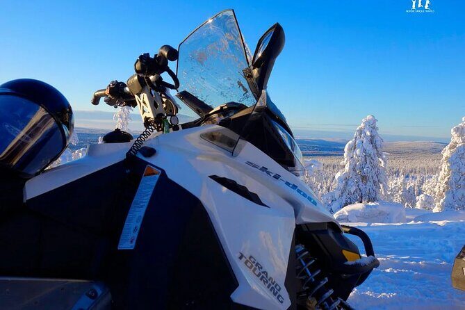 Arctic Circle Family Day - Snowmobiling in pairs: twin riding and switching during the ride