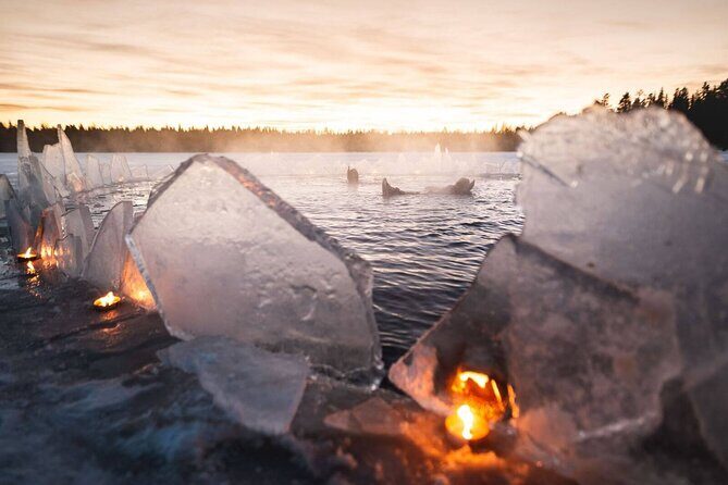 Aurora Arctic Ice Floating in Rovaniemi, Small-group - Warm Drinks, Campfire Cookies, and a Heated Cabin Reset