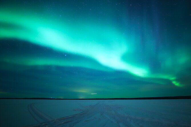 Chasing Aurora with Photographer - Small Group - The open-fire break: sausages, hot drinks, and warm hands