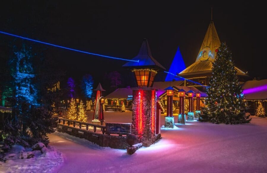 City tour and Santa Claus village visit in Lapland - Crossing the Arctic Circle line: the photo moment that anchors the trip