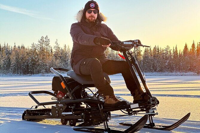 Expedition "INTO THE WILD" Safari and Lunch in Glass Igloo - The scooter safari: snow fun with Andrew’s guidance