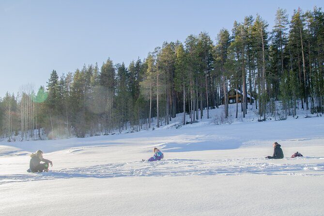 First Ice Fishing Experience in Rovaniemi - Snacks by the Fire: The Part Families Remember