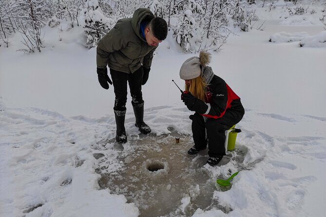 Half-Day Husky Safari and Salmon Ice Fishing Experience - Salmon Ice Fishing in a Private Lake: higher chances, but real luck