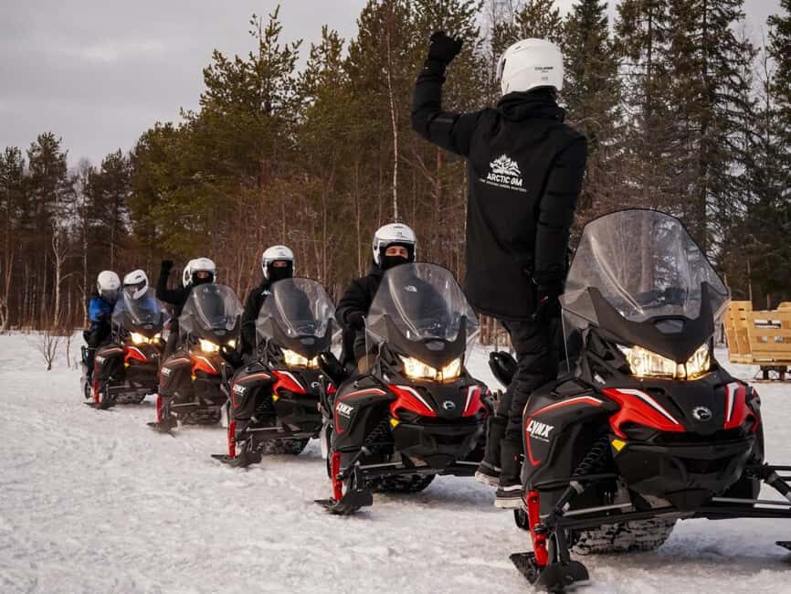 Rovaniemi: Guided Wilderness Snowmobile Safari & Barbeque - Lapland on a private frozen-lake trail