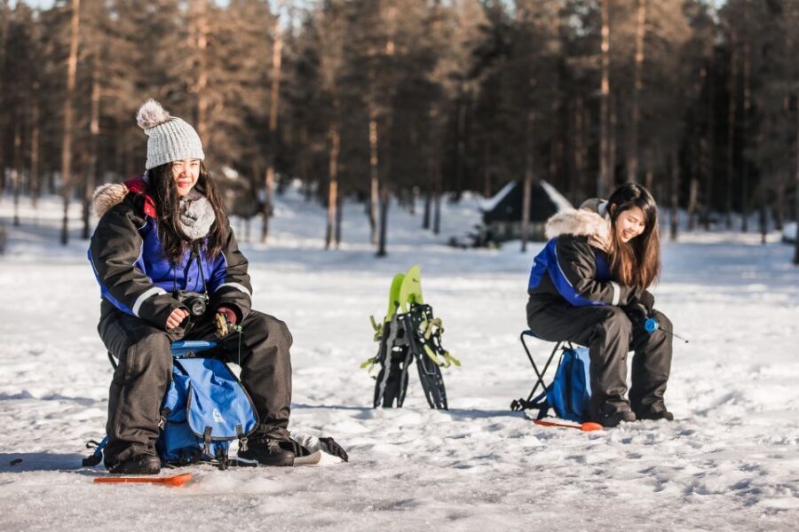 Rovaniemi: Ice Fishing Experience - The short forest walk that turns anticipation into reality
