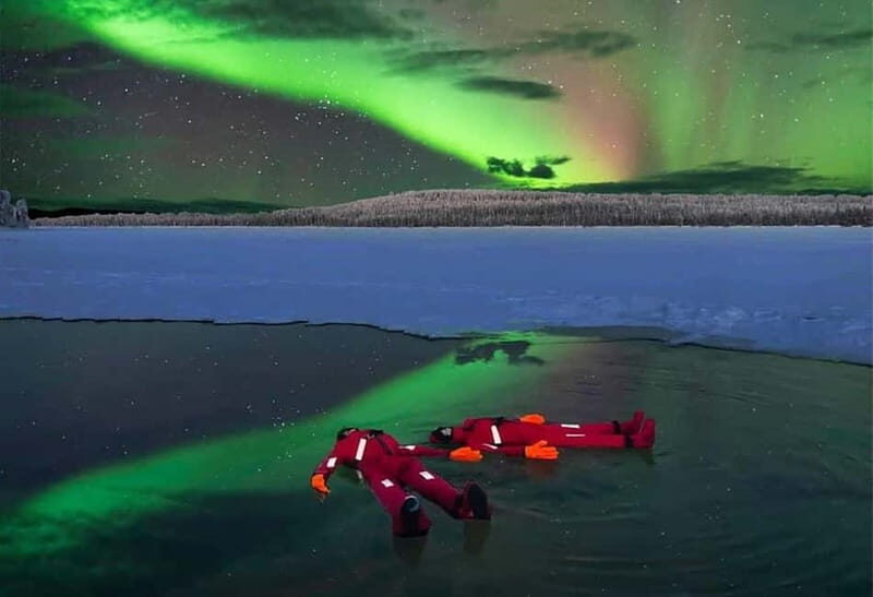 Rovaniemi: Ice Floating in Forest Lake with Aurora Borealis - Your Suit Is the Whole Secret (And It Needs the Right Underlayers)