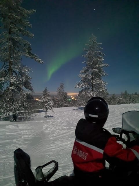 Rovaniemi: Northern Lights Snowmobile Safari with Campfire - The Snowmobile Ride: Following the Guide Through Frozen Night