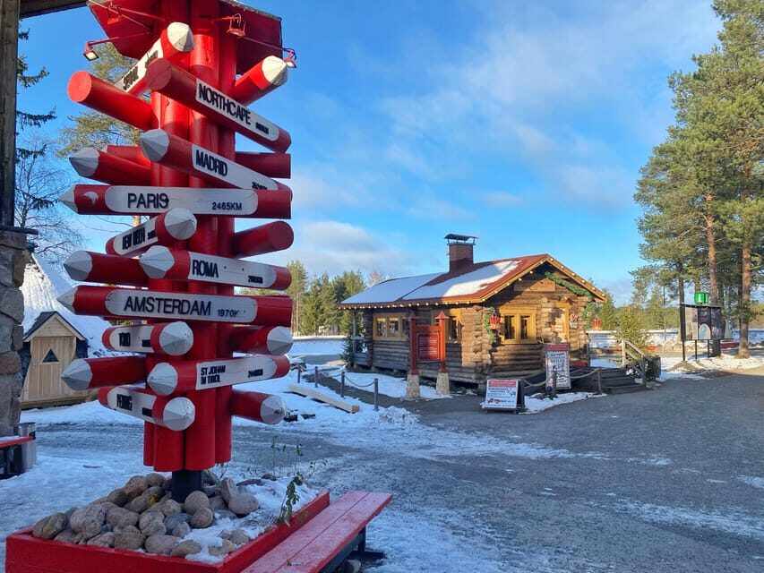 Rovaniemi: Santa Claus Village and Husky sledge/guided tour - Meeting Santa in the office: how to handle the photo line