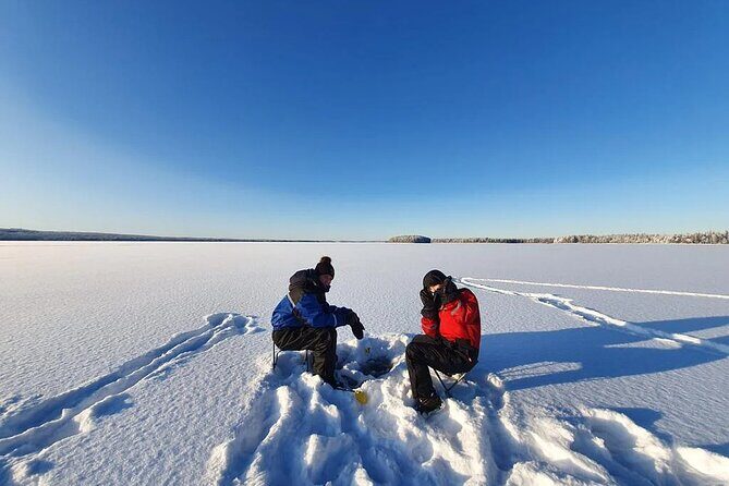 Snowmobile and Ice Fishing Experience - Nordic Unique Travels: snowmobiling through the Lappish forest first