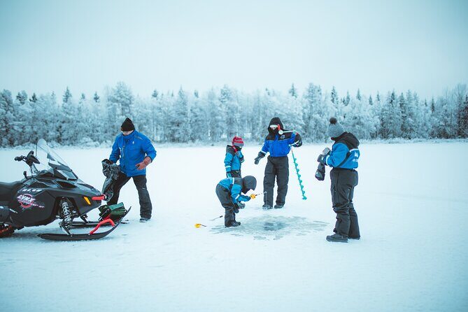 Snowmobiling and ice fishing in Apukka Resort, Rovaniemi - The Bonfire Warm-Up: Tea, Snack, and a Breather from the Wind