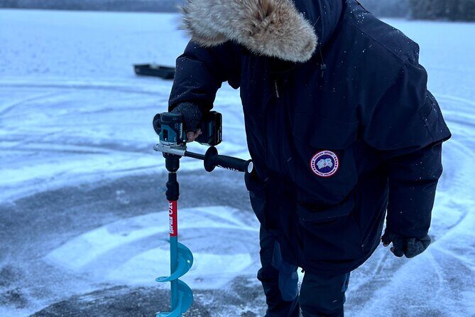 VIP Ice Fishing "ICEBREAKER" Lunch in Glass Igloo - Pickup and winter-ready gear: you show up, they handle the hard parts